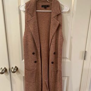 Sleeveless sweater duster